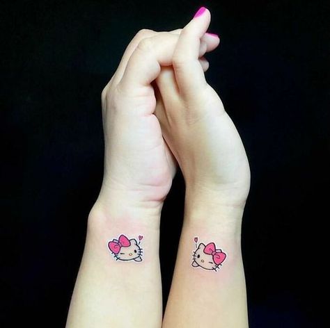 100 Best Friend Tattoos To Commemorate Friend Matching Tattoos For Best Friends Hello Kitty, Hello Kitty Sister Tattoos, Hello Kitty Tattoo Ideas Matching, Hello Kitty And Mimi Tattoo, Hello Kitty Couple Tattoo, Hello Kitty Tattoo Matching, Hello Kitty Finger Tattoo, Hello Kitty Matching Tattoos, Matching Hello Kitty Tattoos