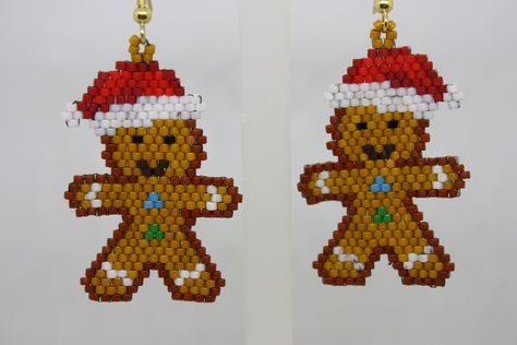 Everyone likes gingerbread men, and if you don't, well, I won't say anything. But if you're a real fan, then these hand-beaded earrings are just for you! From a pattern by ElenaAccessoriesArt on Etsy. EAR370 Gingerbread Beaded Earrings, Beaded Gingerbread Man, Beaded Christmas Jewelry, Beaded Christmas Earrings, Christmas Beaded Earrings, Christmas Beads Craft, Xmas Beads, Mirror Earrings, Christmas Jewelry Diy