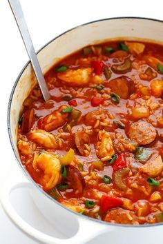 This Jambalaya Soup recipe can be made with shrimp, chicken, Andouille sausage -- or all three! It's easy to make, and so hearty and delicious. | gimmesomeoven.com Jambalaya Soup Recipe, Jambalaya Soup, Chicken Andouille Sausage, Jambalaya Recipe, Gimme Some Oven, Soup And Stew, Andouille Sausage, Andouille, Cajun Recipes