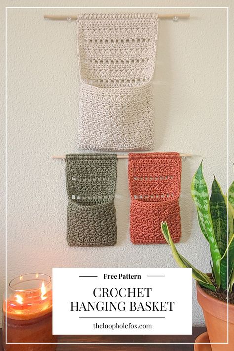 Hanging Storage Crochet Pattern, Crochet Projects Basket, Crochet Pattern For Hanging Basket, Crochet Book Organizer, Crochet Housewarming Gift Ideas, Crochet Hanging Pattern, Crochet Ideas For Home Decor Inspiration, Crochet Plant Wall Hanger Pattern Free, Crochet Wall Holder