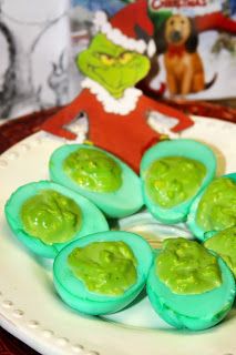 This simple but fun recipe Grinched Eggs is my green take on Deviled Eggs. My kids love em' and got a kick out of the green eggs and filling. Even better, they take only a few minutes to make and are a hit at parties! Grinch Deviled Eggs, Grinch Whobilation, Green Deviled Eggs, Green Food Party, Colored Deviled Eggs Recipe, Colored Deviled Eggs, Movie Dinner, Christmas Party Snacks, Christmas Party Treats