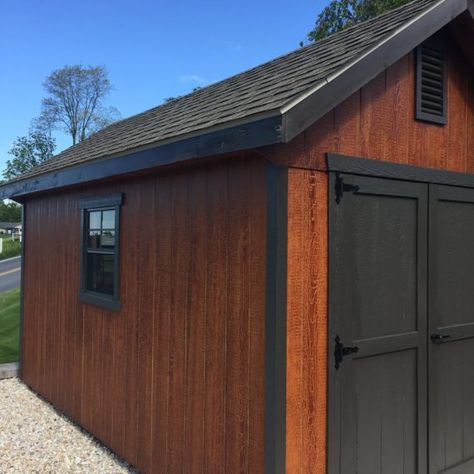 This storage shed is over 10 years old and it looks just as beautiful as they day it was coated!   There is no need to buy a new shed when the coating is starting to fade! Contact us at haleypaint.com to get your shed paint today!   #haleypaint #gardenshed #shed #sheds #recoating #garden Shed Stain Ideas, Storage Shed Paint Ideas, Brown Shed Ideas, Black Shed Ideas, Shed Colors Ideas Paint, Shed Painting Ideas, Cozy Garage, Painted Sheds, Brown Shed