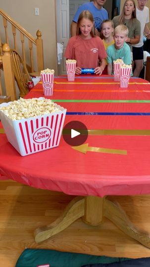 1.1M views · 4.9K comments | The Jumbo Popcorn Prize challenge | prize, film, beverage can | The Jumbo Popcorn Prize challenge Kids, Dad, and family play movie-themed party game with popcorn and soda cans. Funny challenge at the kitchen table... | By Benson Bros | Facebook Benson Bros, Movie Themed Party, Christmas Games, Party Game, Themed Party, Party Games, Popcorn, Kitchen Table, Beverage Can