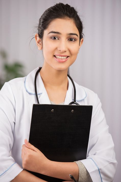 Indian doctor wearing a white coat with ... | Premium Photo #Freepik #photo #people #woman #medical #doctor Female Doctor Outfit, Doctor Outfit Ideas, Indian Doctor, Doctor Outfit, Female Doctor, White Coat, Homeopathy, Premium Photo, Outfit Ideas