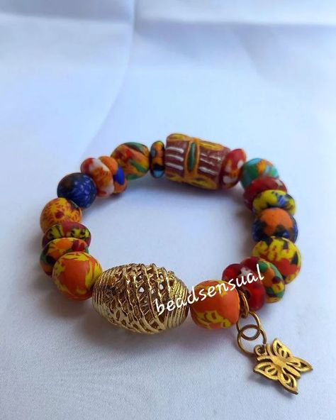 Vibing with the beauty of Ghanaian culture! Which style vibe do you get from this stunning bead bracelet? A) Boho Chic B) Afro-Futurism C) Minimalist Elegance D) Traditional Ghanaian Let us know in the poll below! #GhanaianBeads #BeadedBliss #AfricanJewelry #HandmadeWithLove #BeadedWonders #AfroVibes #JewelryLover #AccessoryGoals #BeadedStyleInspo #culturemeetsfashion Ghanaian Culture, Afro Futurism, African Jewelry, Futurism, Jewelry Lover, Bead Bracelet, Bead Necklace, The Beauty, Boho Chic