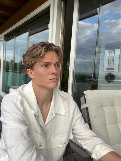 Blonde boy with middle part chilling on the balcony Male Short Middle Part, Men Hairstyles Middle Part, Old Money Middle Part Hair Men, Hair With Middle Part, Blonde Man Hairstyle, Blond Mens Haircut, Men’s Short Middle Part, Men Blonde Hairstyles, Blonde Hair Styles Men