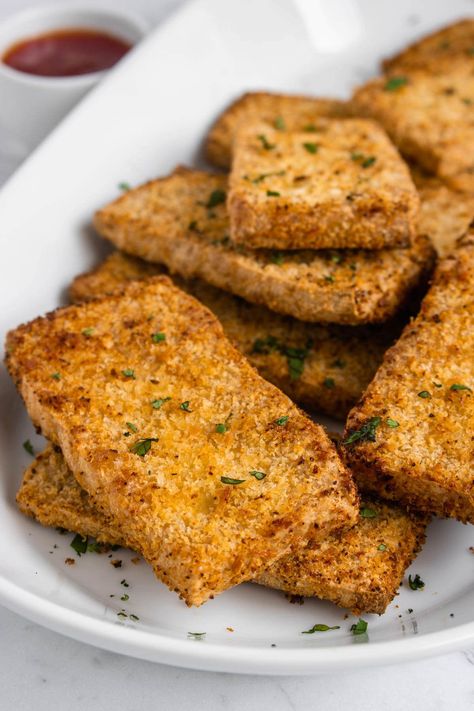 My Crispy Tofu recipe is super easy to make and delicious. It's crispy on the outside and soft in the middle. I show you how to make this in the air fryer and bake it in the oven. This will make you fall in love with Tofu. #tofu #vegan #howtomaketofu Tofu Air Fryer, Breaded Tofu, Tofu Burger, Tofu Steak, Tofu Chicken, Tofu Sandwich, Steak Sandwiches, Air Fryer Recipes Vegetarian, Tofu Vegan