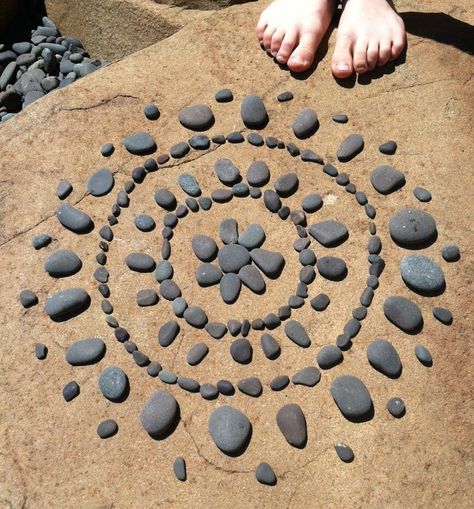 In the Tibetan Buddhist tradition a mandala is a visual representation of the universe, believed to aid focus in meditation and promote a feeling of balance.  The word mandala is taken from the Sanskrit word for circle. Explore this art form by engaging in the creative process of making mandalas with your child from found items from nature. … Continue reading Creating Nature Mandalas With Children Step by Step Nature Mandalas, Nature Activity, Stone Mandala, Nature Mandala, Buddhist Traditions, Earth Art, Outdoor Learning, Tibetan Buddhist, Nature Activities