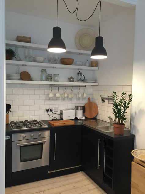 Small Kitchen Airbnb, Small Air Bnb Bedroom Ideas, Black And White Kitchenette, Black Tiny Kitchen, Air Bnb Kitchenette Ideas, Air Bnb Kitchen Set Up, Small Air Bnb Ideas, Cute Air Bnb Ideas, Air Bnb Studio Ideas