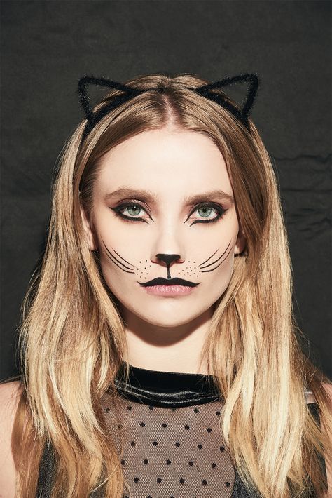 Recreate a cat look this Halloween. Find the accessories and beauty finds you need to complete the look.  #Halloween Cat Makeup Tutorial Halloween, Women’s Cat Costume Diy, Diy Adult Cat Costume For Women, Diy Cat Face Makeup Easy, Cat Makeup Costume, Adult Cat Costume For Women Diy, Cat Costume Diy Women's, Calico Cat Makeup, Womens Cat Costume Halloween