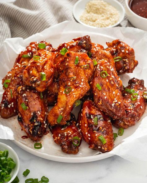 When you taste these Gochujang Korean Chicken Wings you are instantly hit with a sweet, salty, spicy, and tangy experience. These delicious spicy Korean chicken wings are perfect for your bbq party or picnic! Korean Chicken Wings Recipe, Korean Gochujang Chicken, Gochujang Chicken Wings, Korean Chicken Wings, Spicy Korean Chicken, Honey Chicken Wings, Gochujang Chicken, Wings In The Oven, Korean Chicken