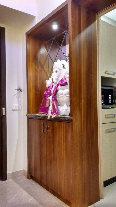 Ganesha idol welcoming you at the entrance, for an apartment in Mumbai by Recrear Designs. #indianhomes #entrance #ganesha Entrance Foyer Design, Modern Apartment Living Room, Ganesha Idol, Entrance Lobby, Door Entrance, Entrance Foyer, Foyer Design, Indian Homes, Space Decor