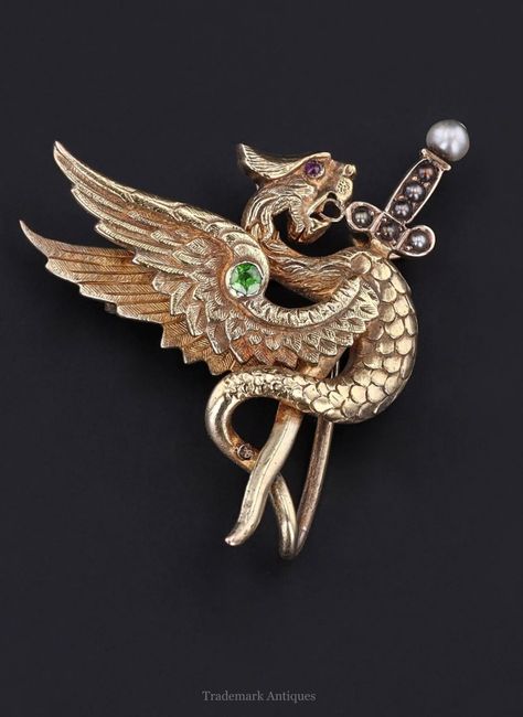 Circa 1910: 14k gold griffin with a demantoid garnet, pearl topped sword and a ruby eye. (TrademarkAntiques / Etsy) Griffin Jewelry, Demantoid Garnet, Star Jewelry, Antique Gold, Antique Jewelry, Concept Design, Garnet, Creative Design, Ruby