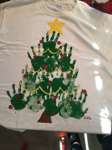 Christmas tree handprint shirt Christmas Tree Shirt Diy, Christmas Tree Handprint, Handprint Shirt, Tree Handprint, Diy Christmas Shirts, Christmas Dress Up, Diy Ugly Christmas Sweater, Handprint Christmas, Diy Preschool