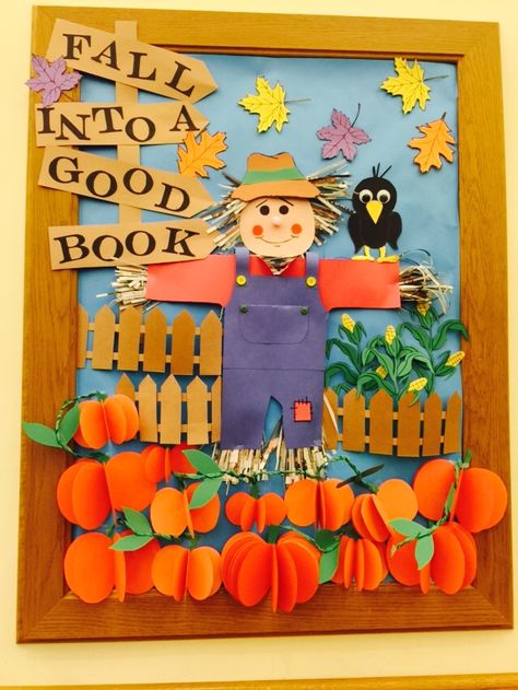 Fall Into A Good Book display at our Columbia Branch Fall Into A Good Book, Fall Library Displays, Middle School Decor, Teaching Decor, Fall Photo Booth, Fall Classroom Door, Thanksgiving Door Decorations, Fall Festival Decorations, Halloween Classroom Door