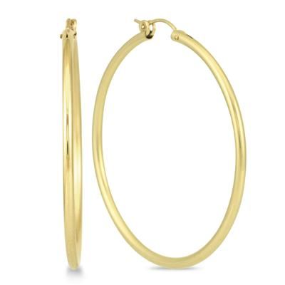 A pair of 14K yellow gold filled hoop earrings with snap down clasps.  These durable hoop earrings measure 50mm in diameter.  Gold filled jewelry consists of a layer of gold bonded to the underlying base metal.  Unlike gold plating, gold filled jewelry is crafted with gold that constitutes at least 5% of the total item weight and will not fade or tarnish like plated jewelry often can.  It can withstand heat and water over time. Gatsby Earrings, How To Clean Earrings, Types Of Earrings, Cartilage Earrings Hoop, Gold Bond, Gold Filled Hoops, Cubic Zirconia Earrings, Zirconia Earrings, Cross Earrings