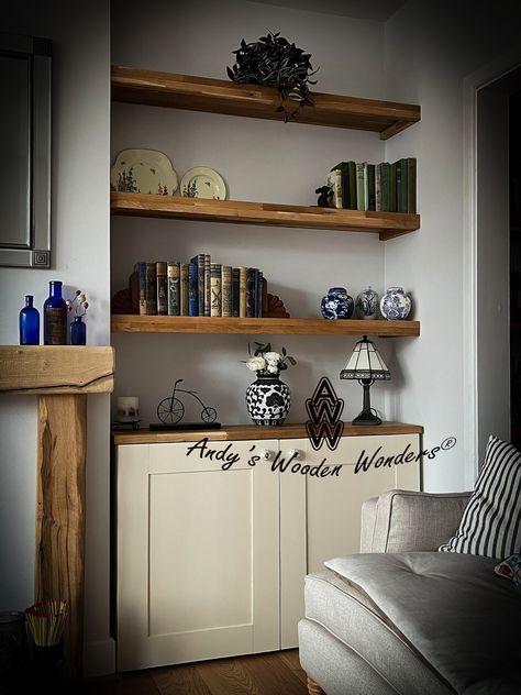 Looking for unique alcove cupboards and shelving tailored to your space? These custom-made cupboards come with solid oak tops and an internal shelf, perfect for adding extra storage in your living area. They are free-standing, allowing flexibility for placement. We can even accommodate plug sockets. Choose your preferred finish colour for the cupboards, while the oak tops are oiled to enhance their natural beauty. Get in touch to chat about your cupboard and shelf ideas. Thank you. Shelving Alcove Ideas, Living Room Alcove Shelving, Alcove Shelving Ideas, Alcove Cupboards And Shelves, Living Room Alcove Cupboards, Kitchen Alcove Ideas, Shelf Alcove, Alcove Shelves, Alcove Cabinets