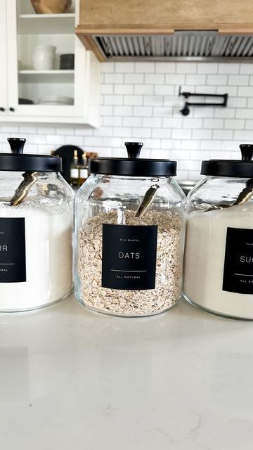 Pantry Drink Organization, Glass Jar Pantry Organization, Pantry Organization Glass Jars, Pantry Container Labels, Black Kitchen Storage Jars, Labels For Pantry Containers, Pantry Inspiration, Apartment Needs, House Essentials