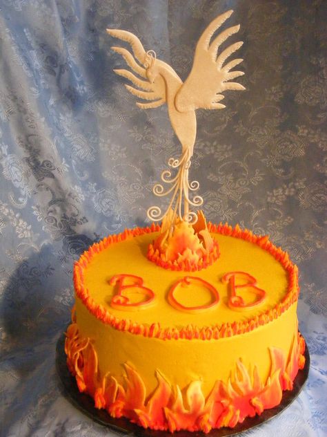 Pheonix is made of gum paste. Flames on side and top center are made with fondant (no tylose added). The rest is all buttercream. Top layer is white chocolate, bottom is pistachio. For my husband's birthday. When we were dating he wrote a lot and one of his stories mentioned a Pheonix rising from the flames. But, would make a good Harry Potter cake too. Dragon Birthday Cakes, Fire Fighter Cake, Fire Cake, Bear Baby Shower Cake, Lily Cake, Harry Potter Theme Birthday, Ice Party, Dragon Cake, Harry Potter Birthday Party