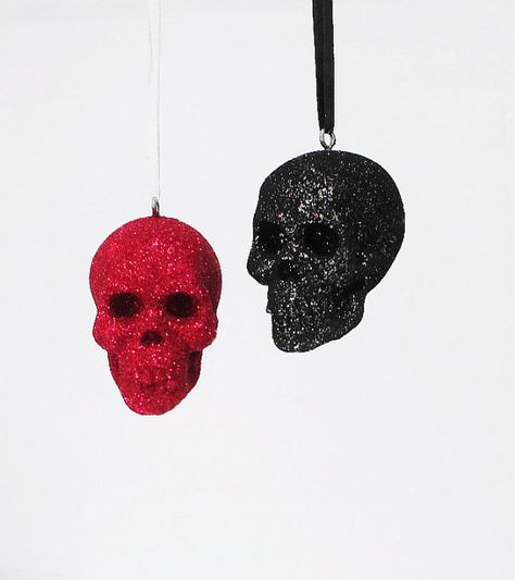 Looking sharp is what these glittered skulls are all about. Hanging from a smooth satin ribbon, these guys will be the VIPs at any glittering gala. Keep the 4 or split them and gift to your skull loving friends. Choose other glittery colors for your sparkly friends. Use drop down menu for your color choice. Measurements: 2long x 1.5high x 1.25wide 5cm x 4cm x 3.5cm. Goth Ornaments Diy, Gothic Christmas Ornaments Diy, Diy Goth Christmas Ornaments, Creepy Christmas Ornaments, Skull Christmas Ornaments, Scary Christmas, Alternative Christmas, Dark Christmas, Creepy Christmas