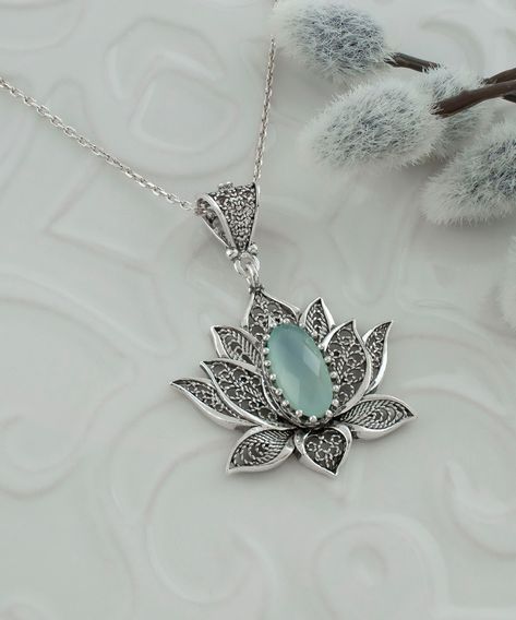 Aqua Chalcedony Silver Victorian Floral Pendant Necklace, Artisan Made Water Lily, Lotus Women Jewelry, Victoria Flower Gothic goth pendant necklace, handmade pendant, floral jewelry gift, aqua blue necklace Gemstone: Aqua Chalcedony 7x14 mm. Material: 925 Sterling Silver ( NICKEL FREE ) Chain Length: -21 Inches ( 53 cm ) -18 Inches + 2 Inches Extender ( 46 cm + 5 cm Extender ) Pendant height and width: -1.25 Inches X 1.25 Inches // 3.2cm X 3.2cm This Chalcedony silver Victorian Lotus Pendant wa Goth Pendant, Lily Lotus, Floral Pendant Necklace, Lotus Pendant, Aqua Chalcedony, Floral Pendant, Flower Pendant Necklace, Sterling Silver Filigree, Gemstone Necklace Pendant