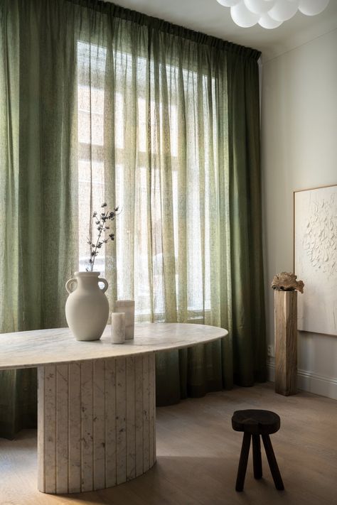 THE PRODUCT The Gotain sheer linen curtains are crafted using a luxurious 100% linen fabric. Each curtain has a hanging strip for easy installation. Our curtains can be suspended using a pole with rings or on a wall / ceiling track using our pleat hooks. Our curtains are all hand customised to the exact length you need Coloured Sheer Curtains, Aesthetic Curtains Living Room, Lounge Room Curtains, Floor To Ceiling Sheer Curtains, Art Deco Curtains Living Room, Curtains 2024 Trends, Curtain Inspiration Living Room, Bedroom Green Aesthetic, Green Curtains Living Room