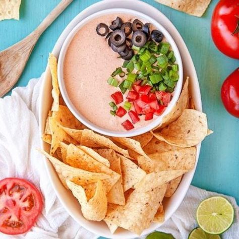 Mexicali Dip is a deliciously fresh and spicy no-bake cheese dip with the perfect blend of southwestern flavors and Mexi-Cali flair. It’s super easy to make and even easier to eat. This is an amazing edible creation you really do need in your life this summer!   Apparently, Mexicali Dip has long been a favorite grocery store dip to grab with your chips, but it’s a new discovery for me. I love being able to whip this up at home, with just a handful of ingredients, and add fresh toppings to dress Mexicali Dip, Baked Cheese Dip, Grape Ice Cream, Potatoes Dauphinoise, Bake Cheese, Roasted Red Pepper Dip, Spicy Dip, Stuffed Pepper Dip, Winter Cooking