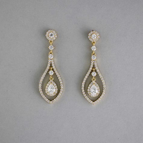 Glistening teardrop-shaped CZ earrings, crafted in layers of timeless beauty, will add a touch of subtle elegance to your bridal look. These earrings are rhodium or gold plated, hypoallergenic, lead, nickel, and cadmium free, and made with AAA CZ stones. They measure about 2 inches long and 5/8 inches wide and have post pierced backs. Bride Hair Down, Teardrop Bridal Earrings, Fav Products, Teardrop Jewelry, Weaving Ideas, Gold Earrings Wedding, Eye Makeup Designs, Subtle Elegance, Pinterest Ideas