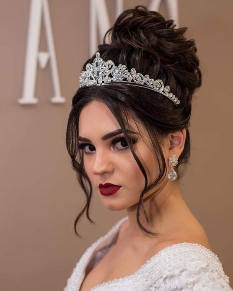 Quince High Bun Hairstyles, High Bun With Tiara, Bridal Updo With Veil And Tiara, Updo With Crown, Bun Quinceanera Hairstyles, Updo With Tiara, Blonde Prom Hair, High Bun Wedding Hairstyles, Bridal Makeup Red Lips