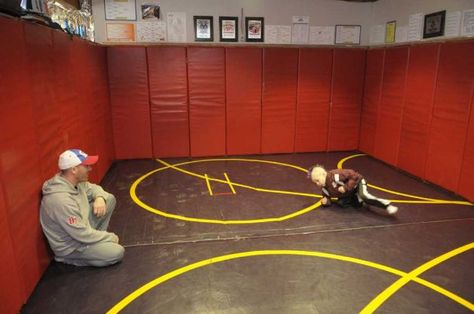 Wrestler Stevo Poulin, 8, practices his moves with his father Steve Poulin in the wrestling room his dad built him in the basement of his home Home Wrestling Room, Wrestling Room Ideas, Wrestling Room, Man Cave Inspiration, Jiu Jitsu Gym, Wrestling Workout, Wrestling Mat, Backyard Sports, Sports Basement