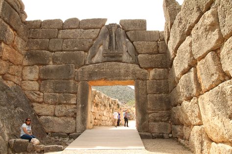 The Lions Gate was the main entrance of the Bronze Age citadel of Mycenae, southern Greece. It was erected during the 13th century BC in the northwest side of the acropolis and is named after the relief sculpture of two lionesses or lions in a heraldic pose that stands above the entrance. The Lion Gate is the sole surviving monumental piece of Mycenaean sculpture, as well as the largest sculpture in the prehistoric Aegean. Lion Gate Portal, At Eternity's Gate Painting, Lion Gate, Lions Gate Portal 2022, Lion Monument, Lion Monument Lucerne, Lions Gate, The Acropolis, Entrance Ways