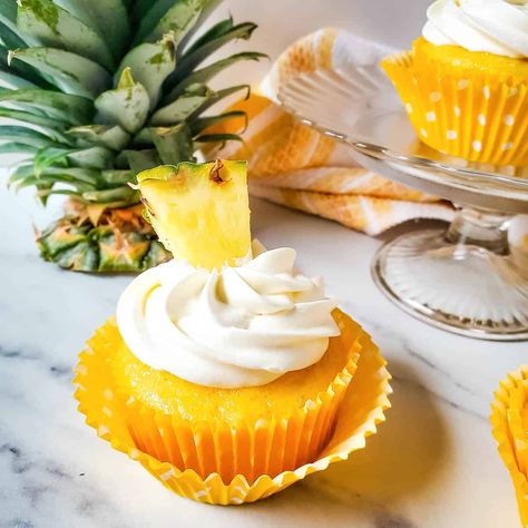 Tropical Pineapple Cupcakes with Cake Mix Recipe - Cupcakes and Cutlery Pineapple Cupcakes Recipes Cake Mixes, Pineapple Cupcakes Recipes, Cake Mix And Crushed Pineapple, Easy Dump Cake Recipes, Pineapple Cupcake, Cherry Pineapple Dump Cake, Banana Pudding Cupcakes, Hawaiian Themed Party, Easy Dump Cake Recipe