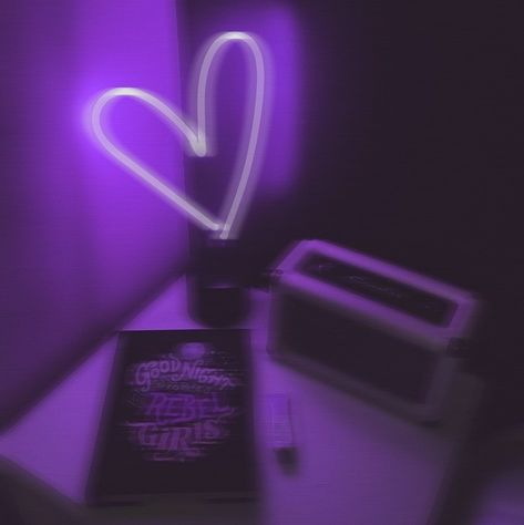 Purple aesthetic heart neon sign on a night stand and a book with a late night vibe blurred Purple Emo Aesthetic, Purple Love Aesthetic, Purple Neon Aesthetic, Neon Widgets, Neon Purple Aesthetic, 2024 Purple, Amine Girl, Purple Place, Wolf Monster