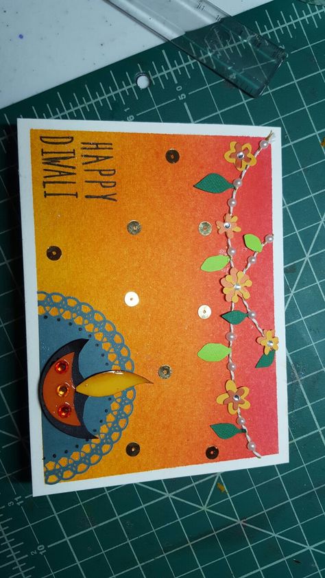 Happy Diwali card #indianmotif #embossing #diya #happydiwali #cardsforeveryoccassion #geetlovespainting #greetingcards #beautifulcolors #lovingit😍 #rangoli #toran #handmade #geetikart Happy Diwali Cards Design, Diwali Handmade Cards, Diwali Cards Handmade Creative, Diwali Project For School, Diy Diwali Cards, Card Making Competition, Handmade Diwali Greeting Cards, Diwali Card Making, Diya Making