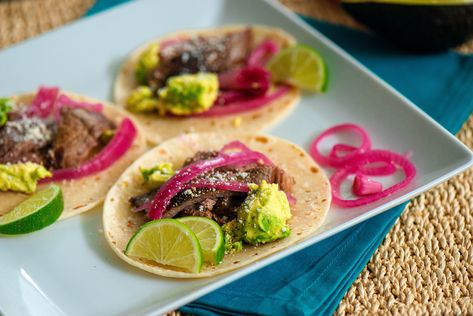 Steak Tacos with Pickled Onions Steak Taco Recipe, Steak Tacos, Cotija Cheese, Mashed Avocado, Pickled Red Onions, Pickled Onions, Skirt Steak, How To Cook Steak, Red Pepper Flakes