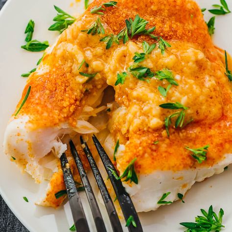 For an easy and healthy weeknight dinner, make baked cod by roasting fresh fillets with parmesan cheese and a simple lemon garlic butter sauce -- the cod becomes tender and flaky, infused with citrus and cheesy flavors. For convenience, only a single pan is needed for both baking the fish and making the sauce. Serve this oven baked cod alongside keto, low carb, and gluten free sides such as spinach or asparagus recipes. Fried Cod Recipes, Lemon Baked Cod, Fresh Lemon Recipes, Lemon Recipes Healthy, Cod Fillet Recipes, Oven Baked Cod, Fish Recipes Baked, Healthy Weeknight Dinners, Cod Recipes