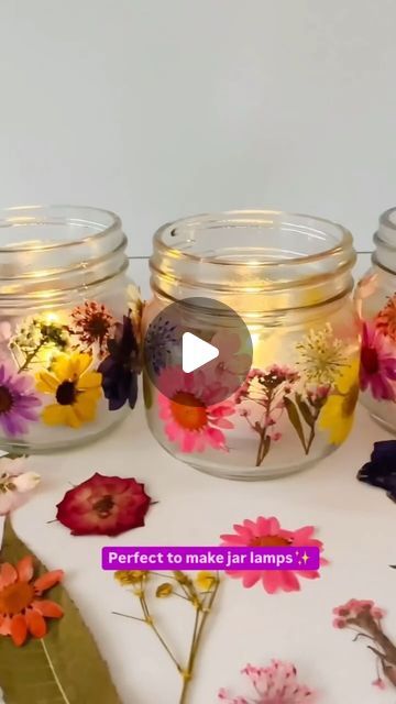 Aranya Aura on Instagram: "Diy requirements💝: 

1. Glass jar
2. Pressed flowers (read the bottom of the caption to know how to make) 
3. Battery candle 
4. Brown thread 
5. Glue mixture 

Turn your empty glass jars into beautiful lamps with this easy peasy diy💕✨ perfect to add some cozy vibes to your space🎀 

Process of making pressed flowers: 

1. Choose fresh, blemish-free flowers and trim them.
2. Place them between paper and press in a heavy book or flower press.
3. Leave them to dry for 1-4 weeks until completely crisp.
4. Carefully remove and store them in a dry place for use.

Try this diy today💕💝❤️🥰

#jarlamp #lamp #diylamp #lampdecor #lampart #handmadelamp #pressedflowers #pressedflowerart #pressedflower #pressedflowerlamp #lampart #décor" Pressed Flower Candles, Battery Candle, Beautiful Lamps, Battery Candles, Flower Press, Pressed Leaves, Pressed Flower Art, Handmade Lamps, Instagram Diy