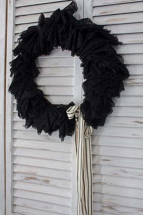 This simple DIY black Halloween wreath featuring black lace only requires a total of three supplies to make! #crafts #halloween #decorations #easy #how-to #wreaths Wreath Halloween, Black And White Halloween Front Porch, Black Halloween Wreath Ideas, Fabric Halloween Wreath, Halloween Wreath Ideas Diy, Halloween Wreaths, Gothic Wreath Farmhouse, Black Mesh Halloween Decor, Halloween Ornament Wreath