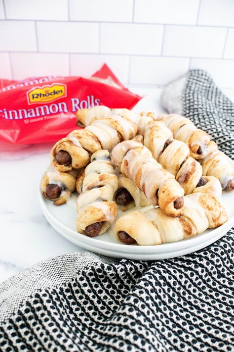 Cinnamon Roll Pigs in a Blanket are a delicious way to start your day. We're using Rhodes cinnamon rolls and breakfast sausage links to make these fun bites. Cinnamon Roll Pigs In A Blanket, Breakfast Pigs In A Blanket, Rhodes Cinnamon Rolls, Rhodes Recipes, Breakfast Sausage Links, Healthy Waffles, Kid Approved Meals, Sausage Links, Diy Desserts