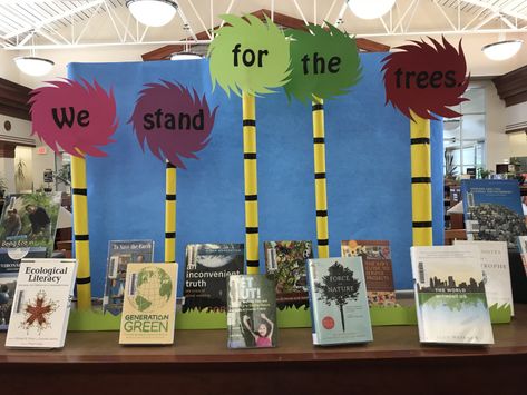 Earth Day Library Display, Holiday Boards, School Library Decor, Truffula Trees, Middle School Libraries, Library Book Displays, Arbor Day, Book Displays, Library Display