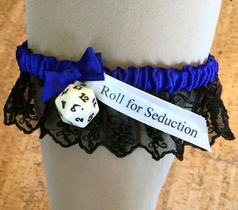 RPG or Dungeons and Dragons wedding garter. by YourThemedWedding Geeky Wedding Favors, Dungeons And Dragons Gift Ideas, Dungeons And Dragons Wedding Ideas, D&d Wedding Theme, Nerd Wedding Dress, Nerd Wedding Ideas, Dungeons And Dragons Crafts, Geek Wedding Ideas, Mtg Wedding