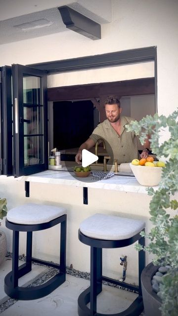 Bobby Berk on Instagram: "Did someone say CONVENIENCE? Check out my latest article (link in bio) talking about the new custom windows including this pass-through window in our kitchen HQ🪟✨ provided by @themarvinbrand that we are in love with 😍🎉" Breakfast Bar In Front Of Kitchen Window, Bar Window In Kitchen, Kitchen Service Window, Pass Through Window Kitchen To Living, Pass Through Window Kitchen, Kitchen Bar Window, Kitchen Pass Through Ideas, Kitchen Pass Through Window, Window Over Kitchen Sink