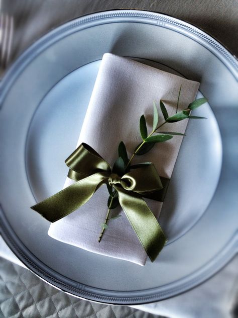 Napkin with ribbon Napkin Fold With Ribbon, Napkin With Ribbon Place Settings, Ribbon Around Napkin Wedding, Napkin Folding Ideas With Ribbon, Ribbon Tied Napkins, Napkin Tied With Ribbon, Napkins With Ribbon, Napkin With Ribbon, Ribbon Napkin Rings