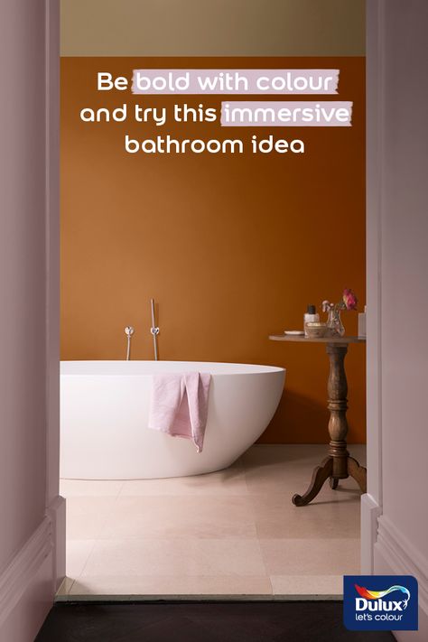 Looking for a bold bathroom colour scheme? An inviting burnt ochre will create an immersive experience.  #Bathroom #BathroomIdeas #BathroomDecor Bathroom Orange Accents, Ochre Bathroom Ideas, Ochre Bathroom, Bold Bathroom Colors, Ochre Wallpaper, Easy Bathroom Makeover, Bathroom Makeover Ideas, Bathroom Colour, Burnt Ochre