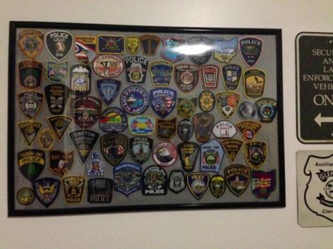 police patch display case Police Patch Display Ideas, Police Patches Display, Patch Display Ideas, Patch Display, Patches Display, Patch Collection, Collection Ideas, Accent Walls In Living Room, Police Patches