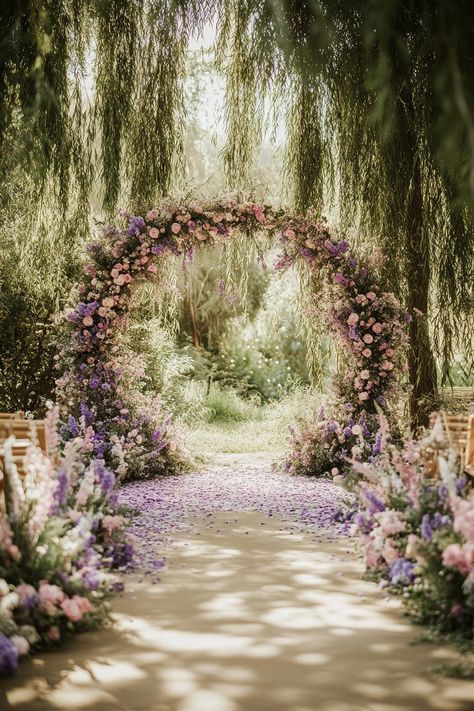 Floral archway with pink and purple petals. Unearth a treasure trove of vibrant and whimsical ideas to sprinkle your spring wedding with the season’s unique charm and charisma. Lavender Garden Wedding, Spring Wedding Decor Ideas, Ethereal Garden Wedding, Fairy Garden Wedding, French Garden Wedding, Spring Wedding Decor, Wisteria Wedding, Spring Magic, Purple Petals