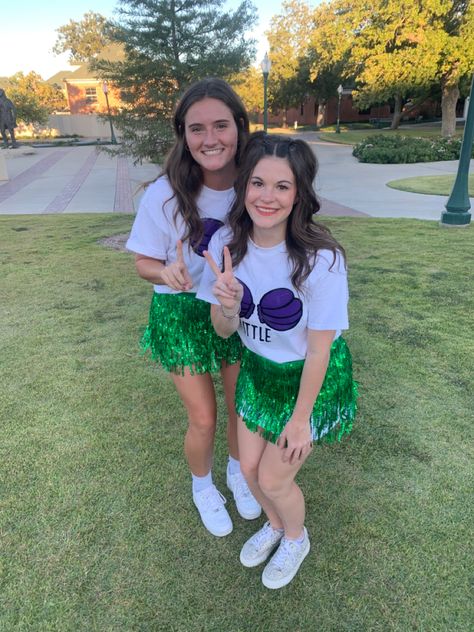 Two sorority girls with little mermaid themed big and little shirts on Mermaid Big Little Reveal, Disney Big Little Reveal Themes, Disney Big Little Reveal, Sorority Family, Big Little Canvas, Disney Reveal, Sorority Themes, Big Little Basket, Alpha Gam