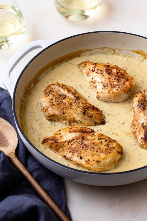 Tender and juicy chicken breasts smothered in the most insanely delicious dijon mustard cream sauce served over fluffy mashed potatoes. The chicken and sauce are all made in one skillet, making it an easy dinner. Perfect for date night or a casual weeknight night. Everyone will love this recipe! Creamy Dijon Sauce, Chicken And Sauce, Creamy Dijon, Cream Sauce For Chicken, Mustard Cream Sauce, Dijon Sauce, Chicken Mashed Potatoes, Chicken Melts, Gourmet Chicken