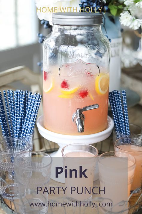 Are you looking for a simple punch that you can take to your next barbeque? This Pink Party Punch will soon become a staple at any barbeque that you attend. Your guest will enjoy this punch as much as you do. This punch can be made for baby showers, birthdays, or just because you want something to drink that tasty and straightforward to make. For more recipes like this, visit Home with Holly J. Pink Beverages Non Alcoholic, Pink Lemonade Party Punch, Pink Baby Shower Punch Recipe, Cute Pink Drinks Party Ideas, Pink Punch Nonalcoholic, Pink Party Punch Alcohol, Pink Drink For Party, Easy Pink Punch Recipes Non Alcoholic, Pink Drinks For Party