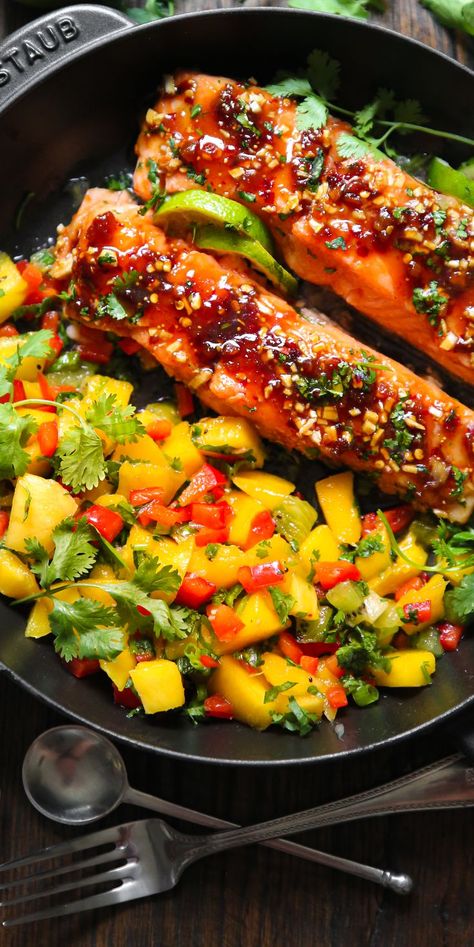 Salmon with Mango Salsa in a cast iron pan. Salmon With Mango Salsa, Mango Salmon, Summer Salmon, Salmon With Mango, Dinner Salmon, Mango Salsa Salmon, Snapper Recipes, Fresh Mango Salsa, Mango Salsa Recipes